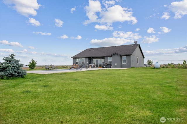 7186 16th Rd NE, Moses Lake, WA 98837 - rear view of property featuring a patio and a yard