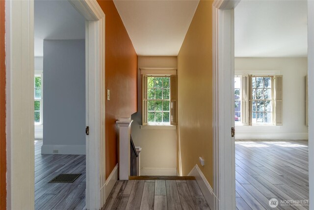 244 Marcus St, Walla Walla, WA 99362 - corridor with wood finished floors and an upstairs landing