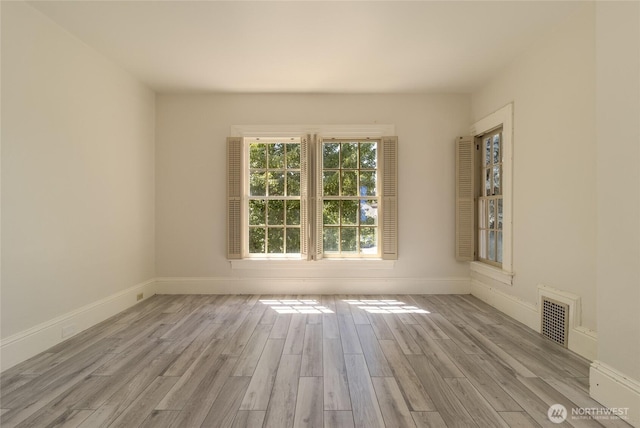 244 Marcus St, Walla Walla, WA 99362 - empty room with wood finished floors and baseboards