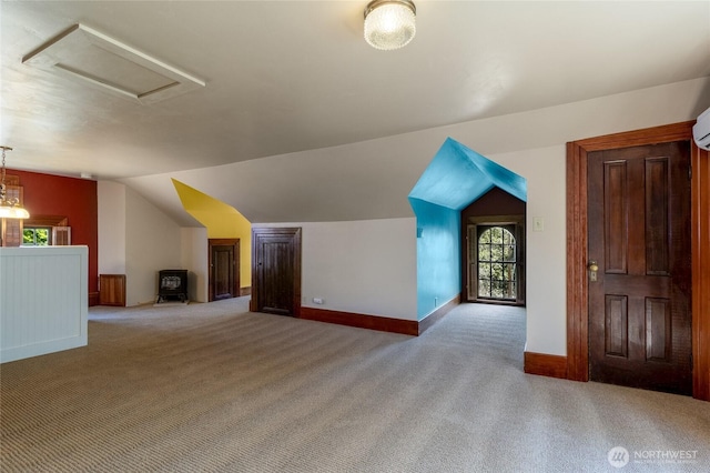 244 Marcus St, Walla Walla, WA 99362 - additional living space with carpet flooring, vaulted ceiling, and attic access