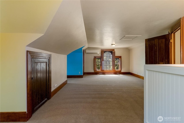 244 Marcus St, Walla Walla, WA 99362 - additional living space featuring a wall unit AC, carpet floors, and vaulted ceiling
