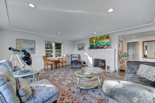 10825 Marine View Dr SW, Seattle, WA 98146 - living room featuring a large fireplace, wood finished floors, and recessed lighting