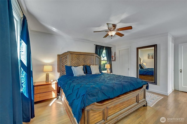 10825 Marine View Dr SW, Seattle, WA 98146 - bedroom featuring light wood-style floors, baseboards, and ceiling fan