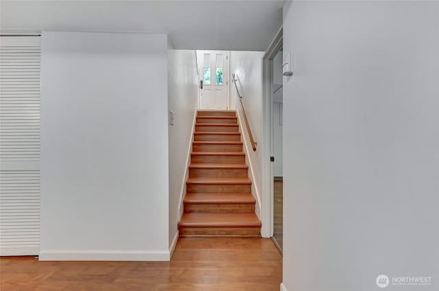 10825 Marine View Dr SW, Seattle, WA 98146 - staircase with wood finished floors and baseboards