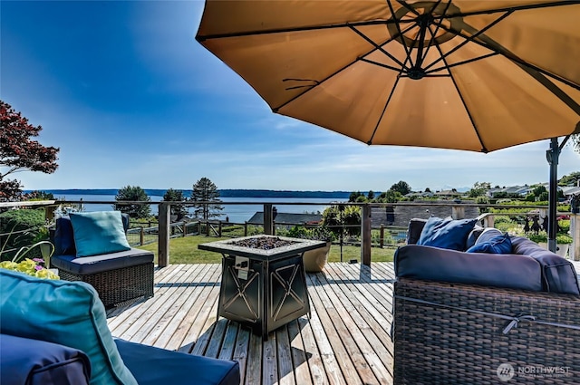 10825 Marine View Dr SW, Seattle, WA 98146 - wooden deck with a water view and a fire pit