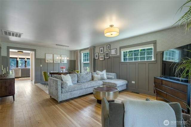515 S Division St, Walla Walla, WA 99362 - living area with plenty of natural light, light wood-style floors, and a decorative wall