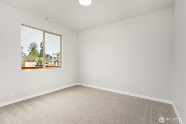 13307 SE 238th Pl Unit 11, Kent, WA 98042 - carpeted empty room with baseboards