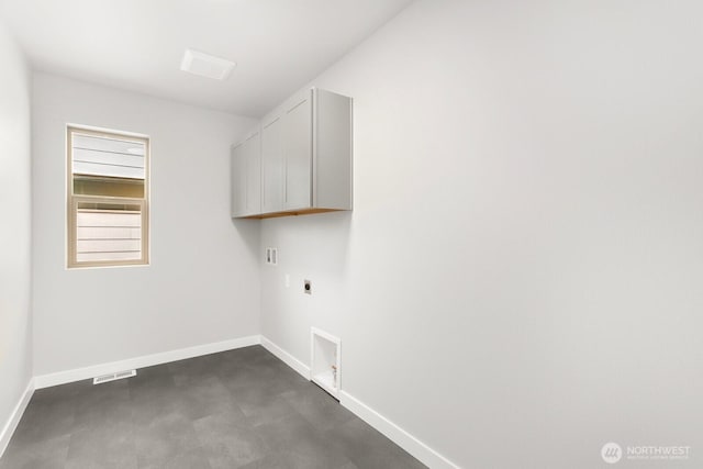 13307 SE 238th Pl Unit 11, Kent, WA 98042 - laundry area featuring cabinet space, electric dryer hookup, baseboards, and washer hookup