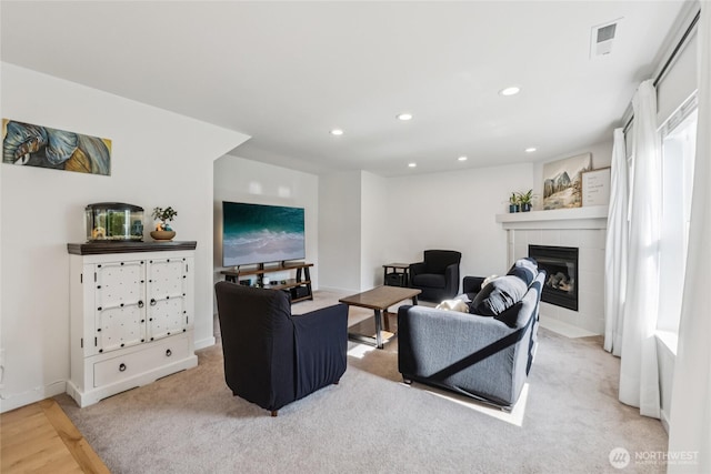 15503 39th Ave SE, Bothell, WA 98012 - living area with a fireplace, recessed lighting, and wood finished floors
