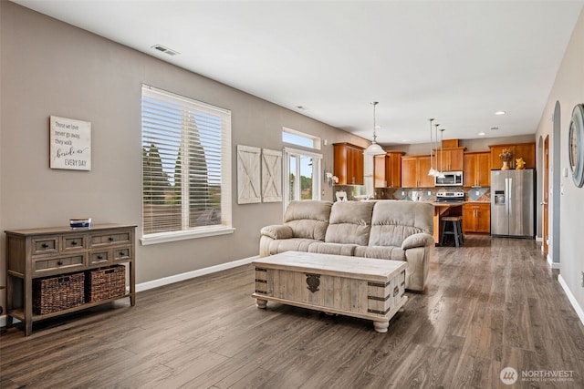 10089 Jensen Dr SE, Yelm, WA 98597 - living area with dark wood-type flooring and recessed lighting