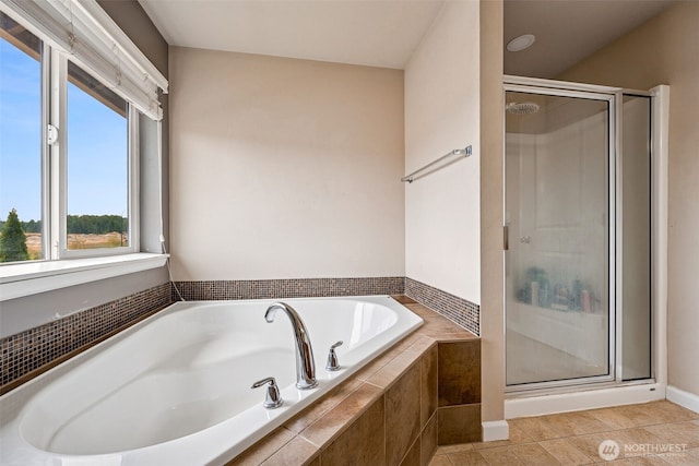 10089 Jensen Dr SE, Yelm, WA 98597 - full bath featuring a shower stall, a bath, and tile patterned floors