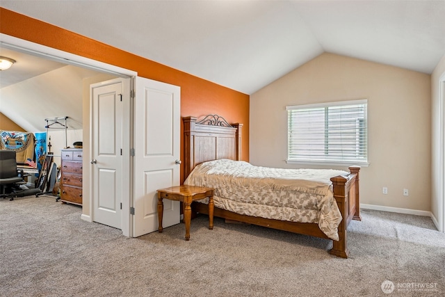 10089 Jensen Dr SE, Yelm, WA 98597 - carpeted bedroom with vaulted ceiling and baseboards
