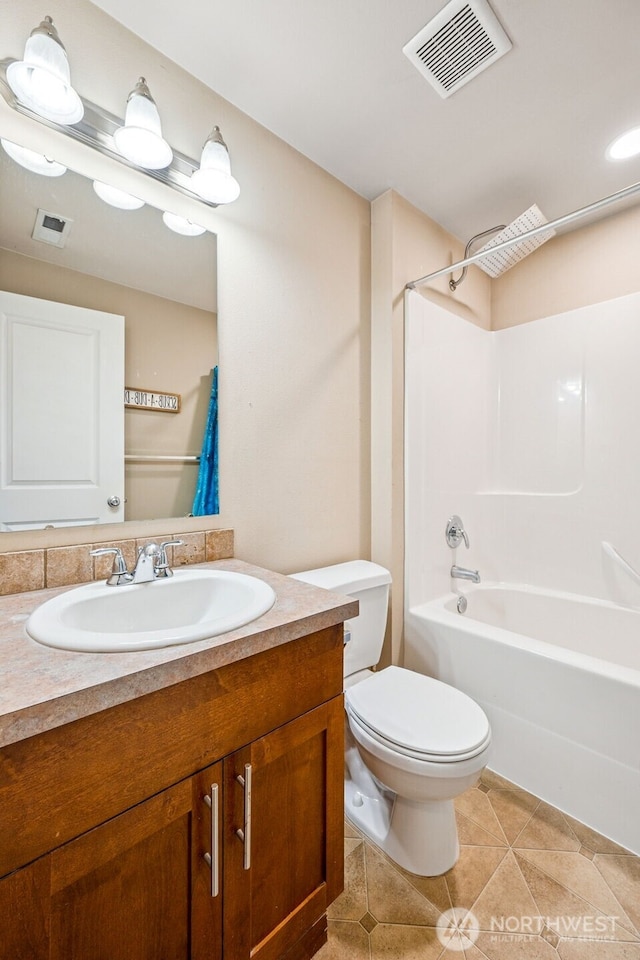 10089 Jensen Dr SE, Yelm, WA 98597 - bathroom featuring vanity, tile patterned floors, and shower / bathtub combination