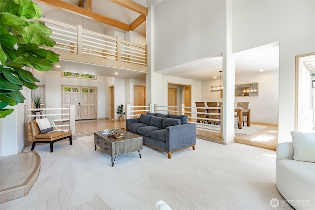 5520 Canvasback Rd, Blaine, WA 98230 - carpeted living area with a high ceiling and baseboards