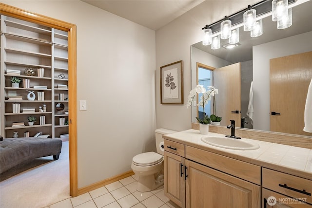 5520 Canvasback Rd, Blaine, WA 98230 - bathroom featuring toilet, vanity, tile patterned floors, and baseboards