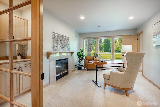 5520 Canvasback Rd, Blaine, WA 98230 - carpeted living area with a tile fireplace, recessed lighting, and baseboards