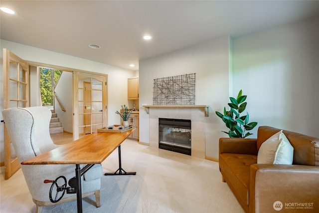 5520 Canvasback Rd, Blaine, WA 98230 - home office featuring a tiled fireplace, light colored carpet, and recessed lighting