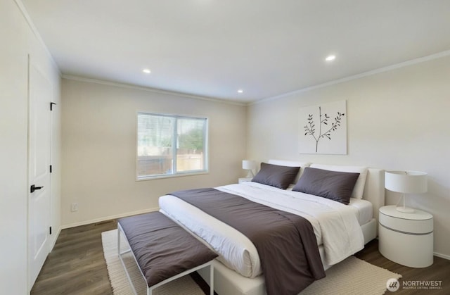 704 N 3rd St, Westport, WA 98595 - bedroom featuring crown molding, dark wood-style floors, recessed lighting, and baseboards