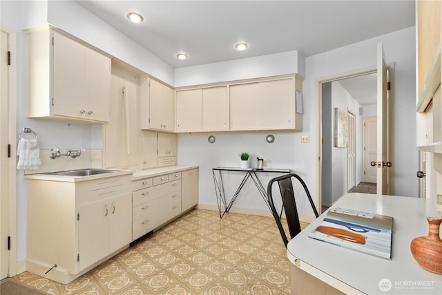 1101 Terrace Dr, Lynden, WA 98264 - kitchen with light countertops, light floors, cream cabinetry, and recessed lighting