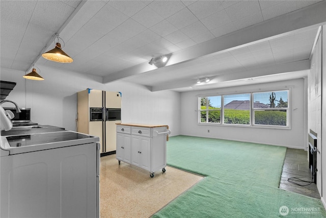 1101 Terrace Dr, Lynden, WA 98264 - kitchen with range with electric stovetop, light carpet, open floor plan, white cabinets, and white refrigerator with ice dispenser