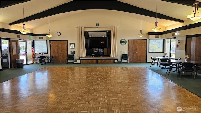 1402 22nd St NE Unit 252, Auburn, WA 98002 - living room with high vaulted ceiling, beamed ceiling, and arched walkways