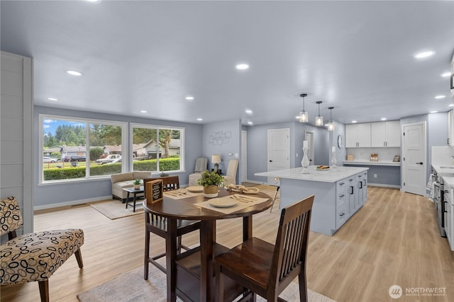 18604 9th Avenue Ct E, Spanaway, WA 98387 - dining area featuring light wood-type flooring and recessed lighting