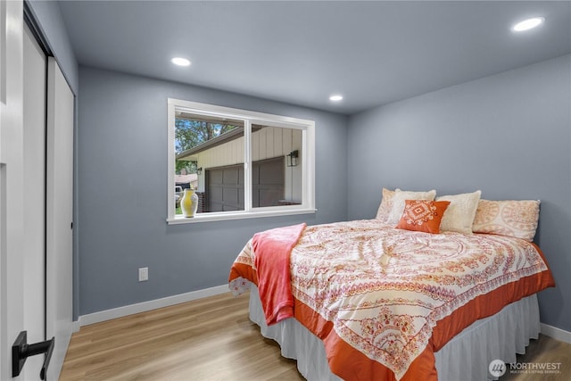 18604 9th Avenue Ct E, Spanaway, WA 98387 - bedroom with a closet, wood finished floors, and recessed lighting