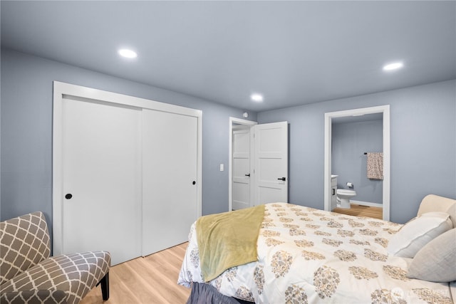18604 9th Avenue Ct E, Spanaway, WA 98387 - bedroom with a closet, wood finished floors, recessed lighting, and ensuite bathroom