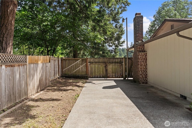 18604 9th Avenue Ct E, Spanaway, WA 98387 - view of yard featuring a gate and a patio