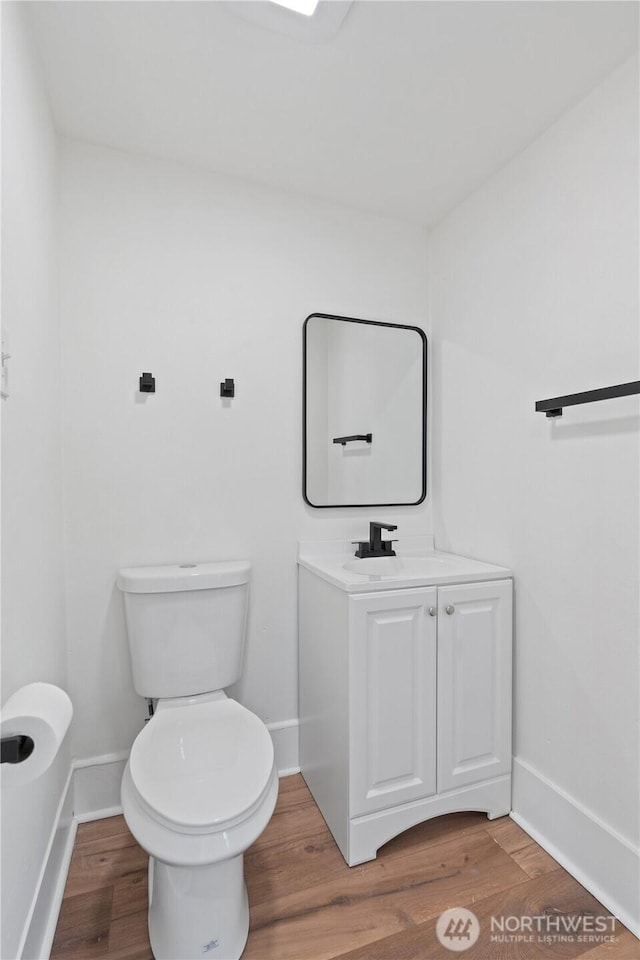 422 S Wright Ave, Tacoma, WA 98418 - half bathroom with vanity and wood finished floors