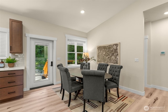 17765 25th Ave NE, Shoreline, WA 98155 - dining area featuring light wood finished floors, recessed lighting, baseboards, and lofted ceiling