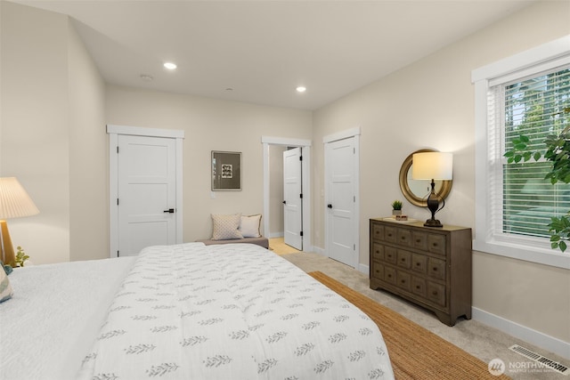 17765 25th Ave NE, Shoreline, WA 98155 - bedroom with light carpet, baseboards, and recessed lighting