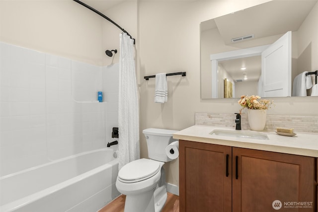 17765 25th Ave NE, Shoreline, WA 98155 - bathroom with vanity, toilet, tasteful backsplash, shower / bathtub combination with curtain, and wood finished floors