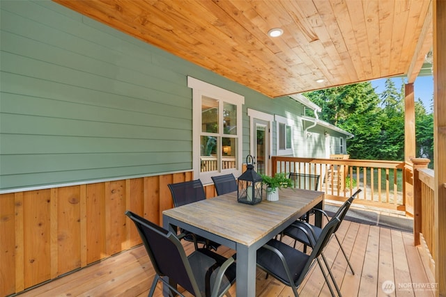 17765 25th Ave NE, Shoreline, WA 98155 - wooden deck featuring outdoor dining area