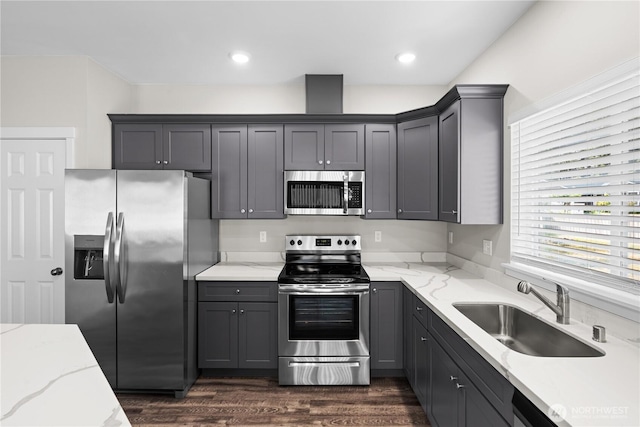 17621 Vine Ln SE, Yelm, WA 98597 - kitchen featuring appliances with stainless steel finishes, gray cabinetry, dark wood-style floors, light stone countertops, and recessed lighting