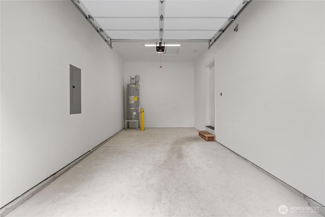 17621 Vine Ln SE, Yelm, WA 98597 - garage featuring electric panel, a garage door opener, and secured water heater