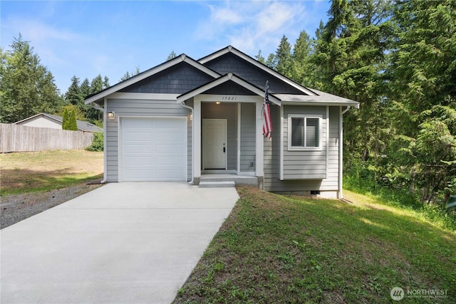17621 Vine Ln SE, Yelm, WA 98597 - view of front of property with concrete driveway and a garage