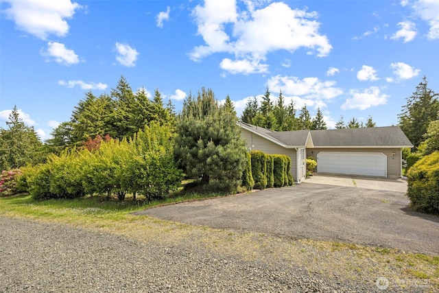 5 Bayview Ln, Hoquiam, WA 98550 - view of front of home with asphalt driveway and an attached garage