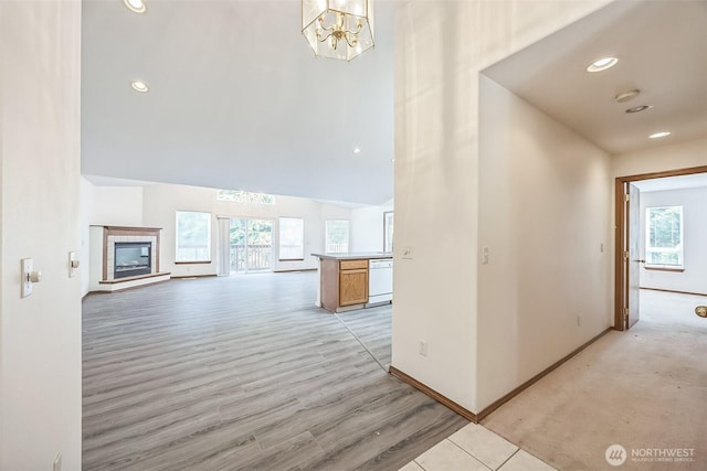 5 Bayview Ln, Hoquiam, WA 98550 - hallway featuring a chandelier, plenty of natural light, light wood finished floors, recessed lighting, and a towering ceiling