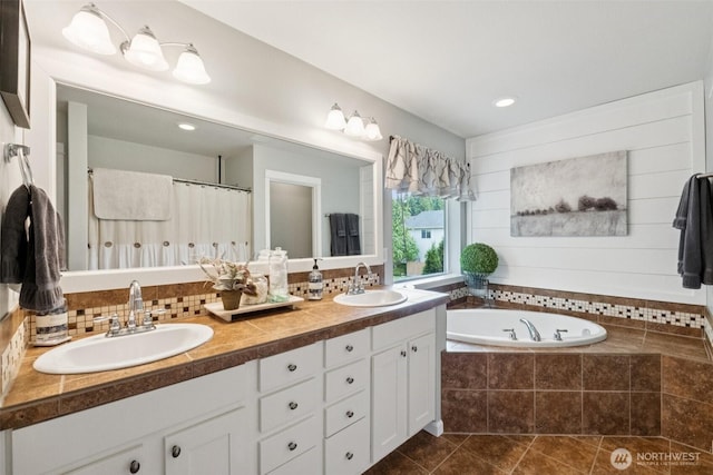 19409 90th Avenue Ct E, Graham, WA 98338 - full bath featuring double vanity, a garden tub, tile patterned flooring, and a shower with curtain