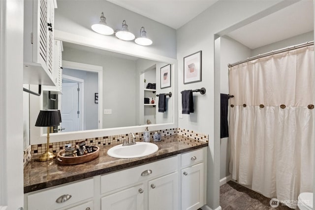 19409 90th Avenue Ct E, Graham, WA 98338 - bathroom with tasteful backsplash, vanity, a shower with curtain, and toilet
