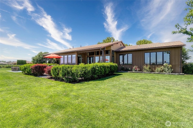 2316 Ridgeview Rd, Walla Walla, WA 99362 - back of property featuring board and batten siding and a yard