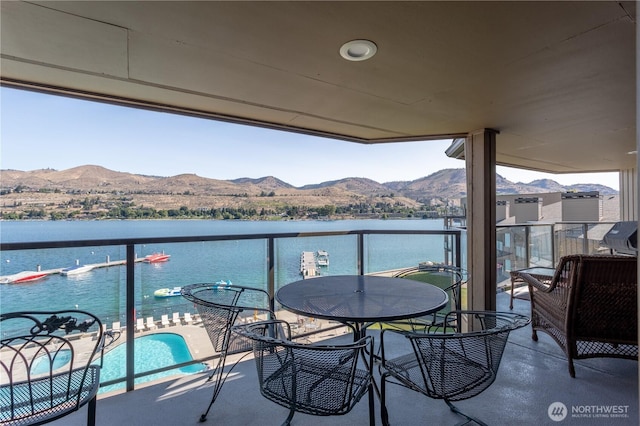 103 N Park St Unit 341, Chelan, WA 98816 - balcony featuring view of pool area and a water and mountain view