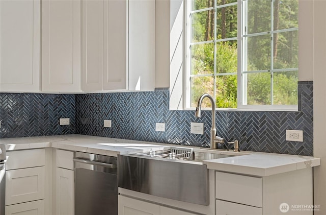 10642 Merry Canyon Rd, Leavenworth, WA 98820 - kitchen featuring a sink, tasteful backsplash, white cabinets, and light stone countertops