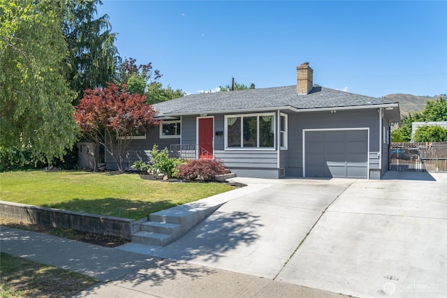 1108 Amherst Ave, Wenatchee, WA 98801 - ranch-style house featuring a garage, a chimney, driveway, and a shingled roof