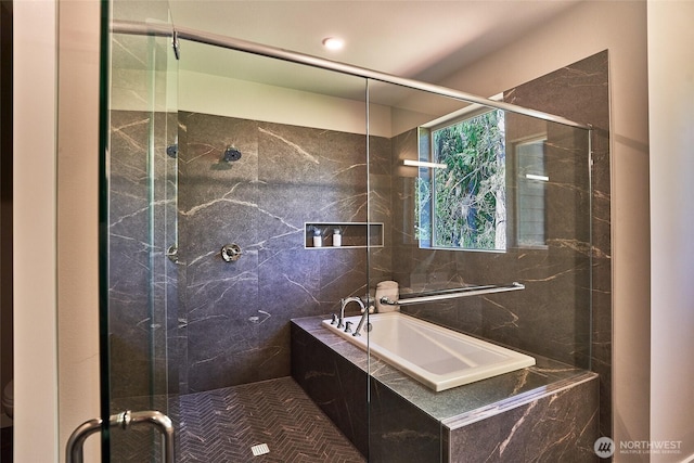 17615 142nd Ave E Unit 14, Puyallup, WA 98374 - bathroom featuring a stall shower, a bath, and tile walls
