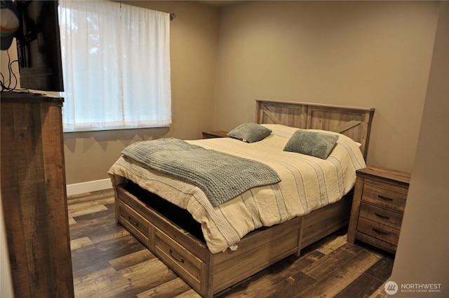613 Aster Ct SE, Ocean Shores, WA 98569 - bedroom featuring wood finished floors and baseboards