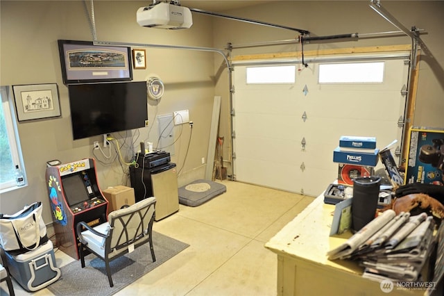 613 Aster Ct SE, Ocean Shores, WA 98569 - garage featuring a garage door opener