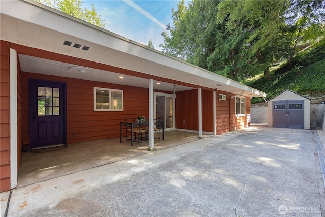 2463 74th Ave SE, Mercer Island, WA 98040 - exterior space with a shed and a patio