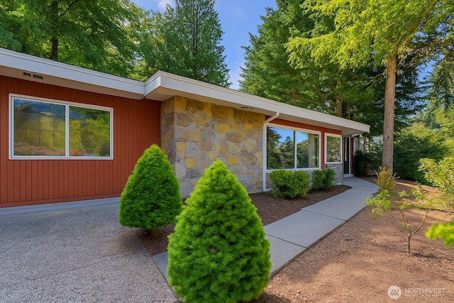 2463 74th Ave SE, Mercer Island, WA 98040 - view of property exterior featuring stone siding